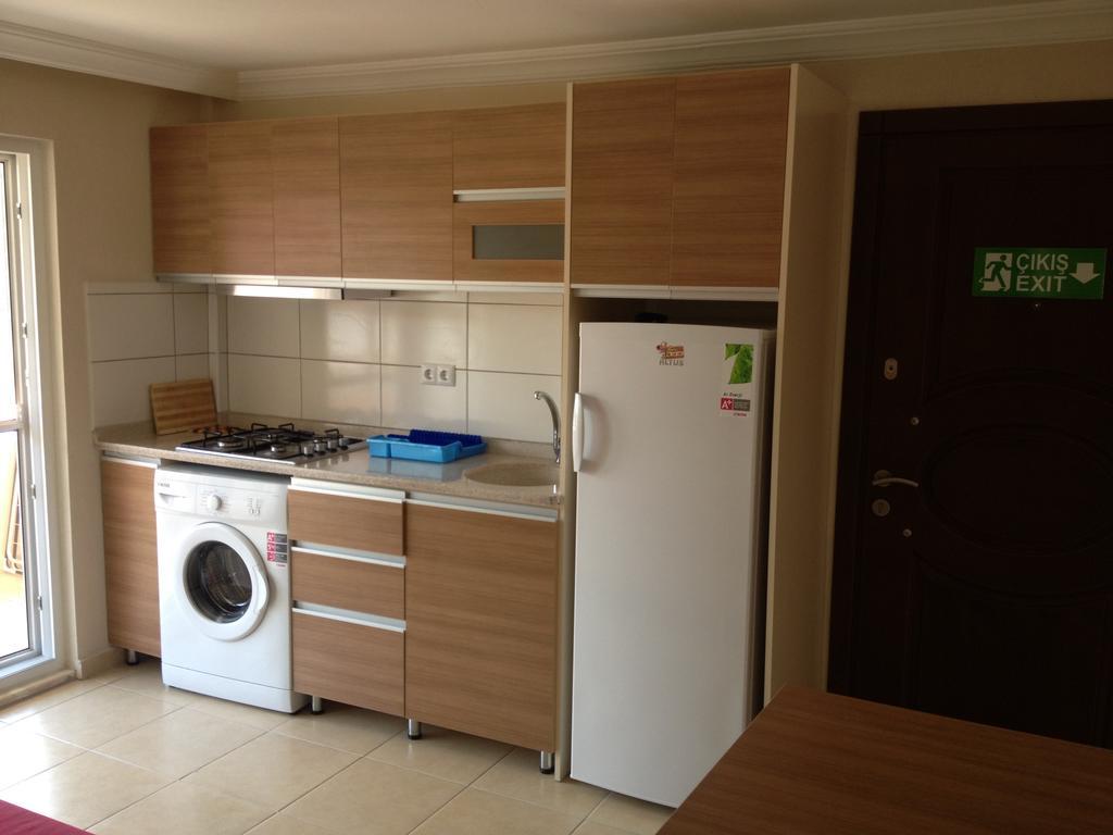 Karya Apartments كويجيز الغرفة الصورة